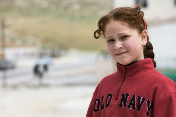 Asma, 9, haaveilee kunnollisesta kodista ja kirjoista.